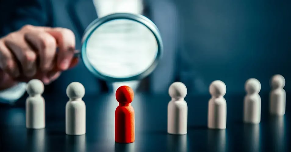 an image showing identity management by using a different colored object representing users within an organization