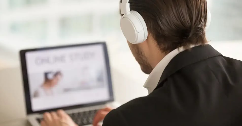 employee attending online cybersecurity awareness training on a laptop