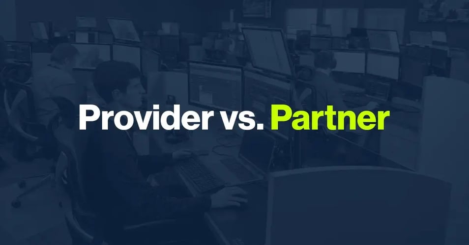 Community bank IT team in a network operations center, representing the difference between an IT provider vs partner relationship